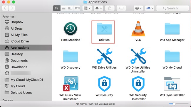 Truy cập vào Applications và chọn Utilities để mở Disk Utility hoặc cách đơn giản hơn, bạn có thể dùng tổ hợp Command và Space để mở cửa sổ này